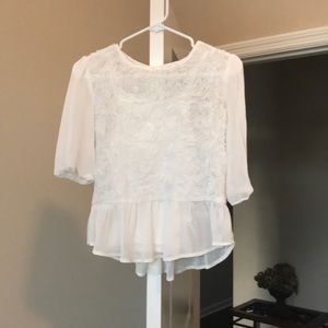 White, light weight blouse with floral detailing